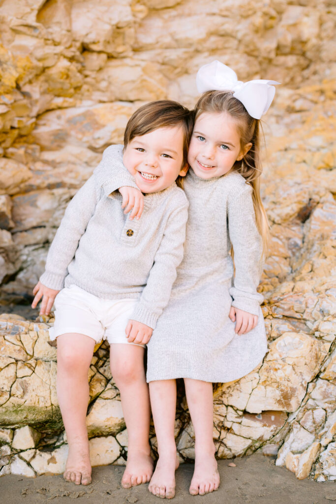 siblings posing for a picture