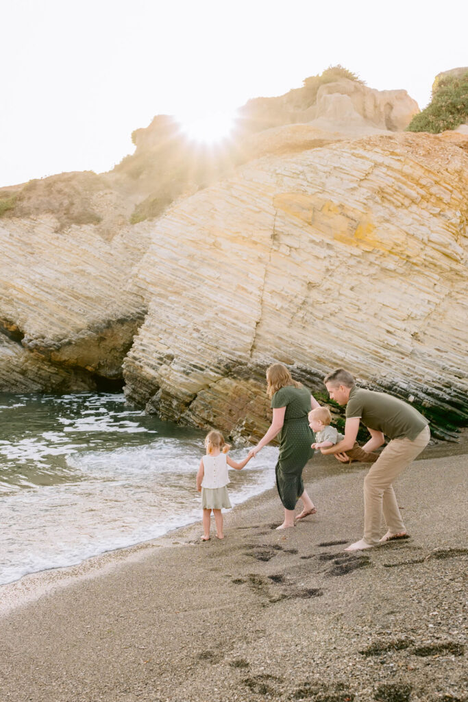 Family of four in Morro Bay during a family photo session